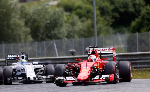 Red Bull Ring, Spielberg, Austria. Sunday 21 June 2015. Sebastian Vettel, Ferrari SF-15T, leads Felipe Massa, Williams FW37 Mercedes. World Copyright: Alastair Staley/LAT Photographic. ref: Digital Image _R6T5991