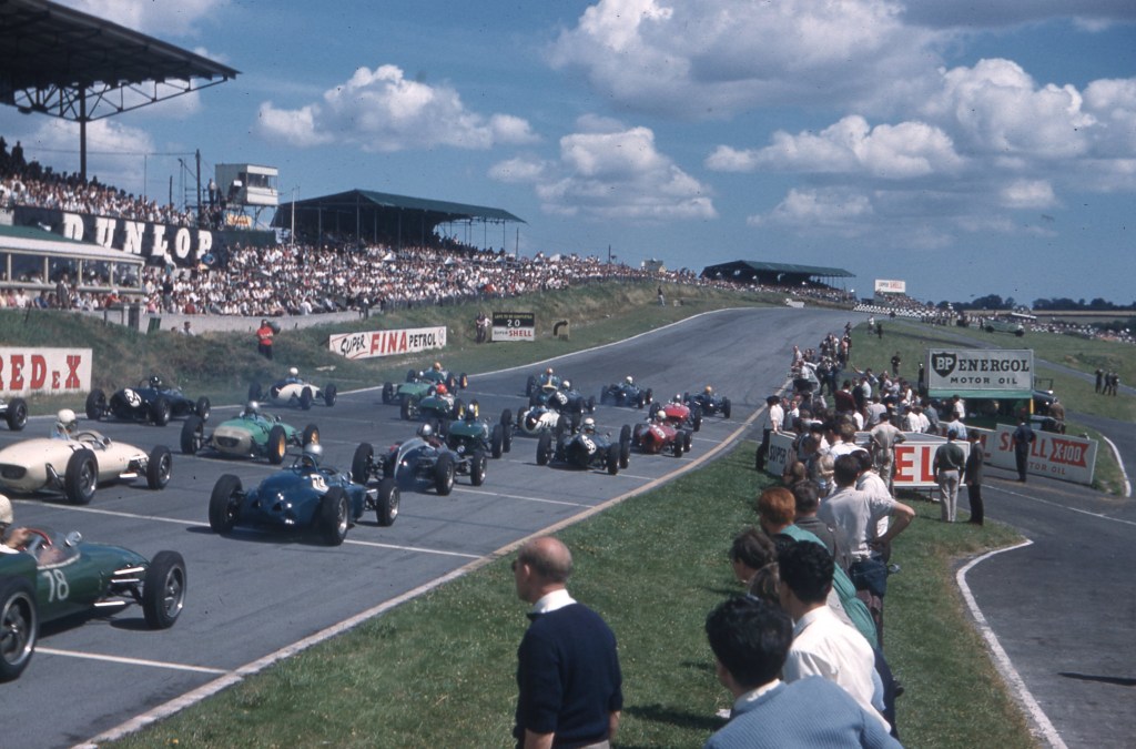 A race track with cars on it

Description automatically generated with low confidence